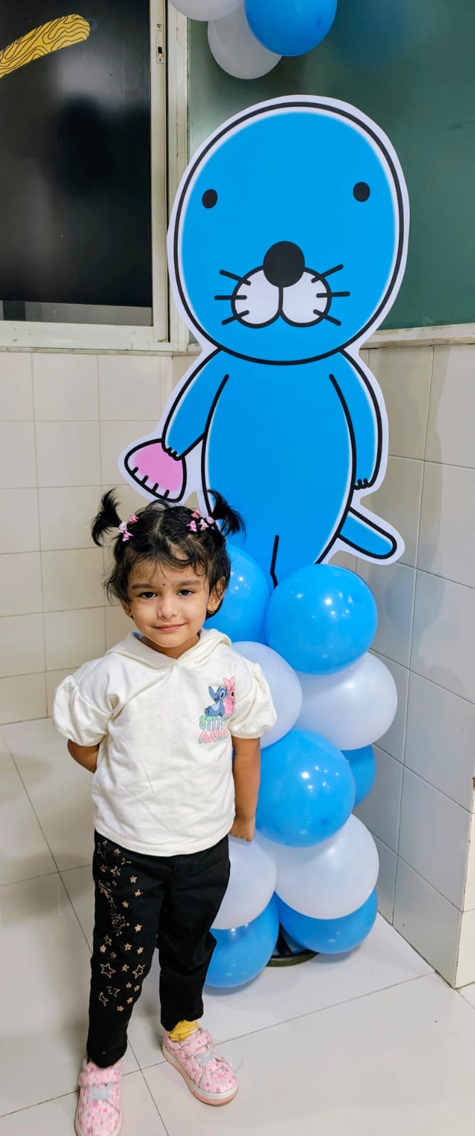 Child posing with Bonobono at the family fest